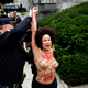 Illustration for article titled Protester Rushes Bill Cosby as He Enters Courthouse for Sexual Assault Trial